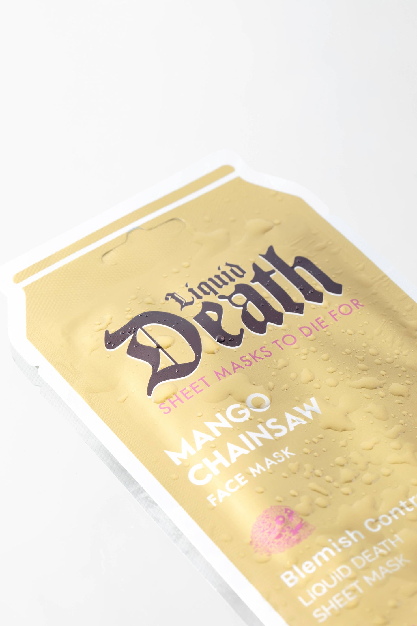 Mango Chainsaw Liquid Death Blemish Control Face Mask